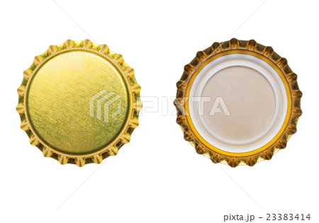 yellow bottle caps isolated on white background 23383414