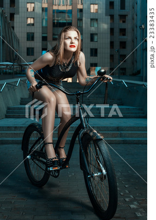 Girl in a rock style. 23383435