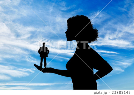 Silhouette feminist holding a small man. Silhouette feminist holding a small man. 23385145