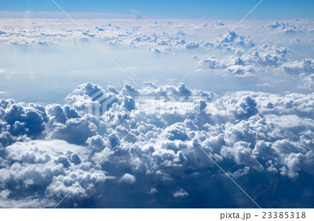 Blue sky background with tiny clouds Blue sky background with tiny clouds 23385318