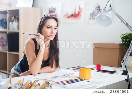 Side view portrait of a happy artist at the 23394601