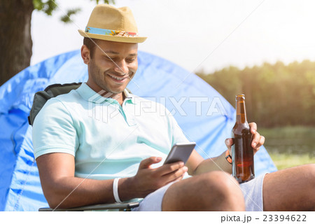 Joyful man resting in the nature Joyful man resting in the nature 23394622