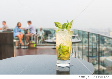 Mojito cocktail on table in rooftop bar Mojito cocktail on table in rooftop bar 23396322