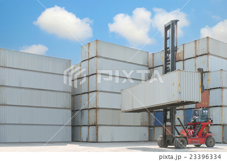 Crane lifte up container box loading to depot 23396334