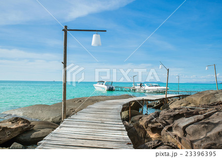 Wooded bridge in harbour against blue sky Wooded bridge in harbour against blue sky 23396395