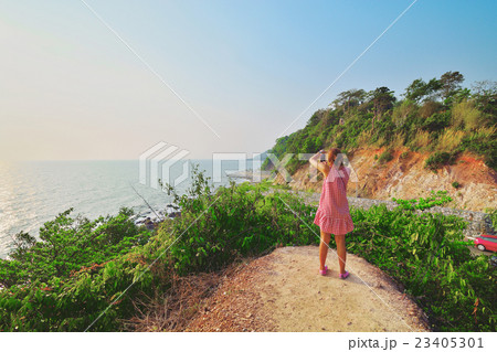 Woman shot on the mountain with a mobile phone . 23405301