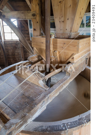Moving Millstone in historic Danish windmill 23409491
