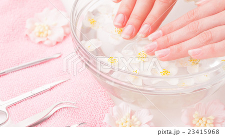 Woman hands in bath with water Woman hands in bath with water 23415968