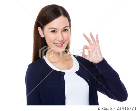 Young Woman with ok sign gesture Young Woman with ok sign gesture 23416771