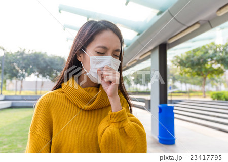 Young Woman coughing Young Woman coughing 23417795