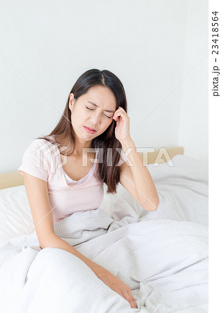 Woman feeling headache 23418564