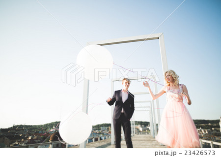 Lovers man and woman embracing each other outdoors 23426573