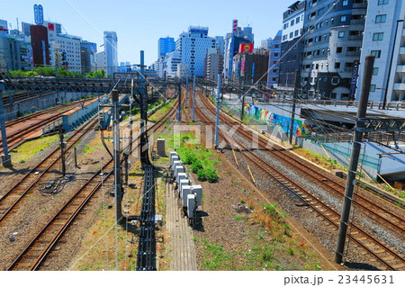 池袋大橋から見た埼京線と東武東上線の都市景観の写真素材