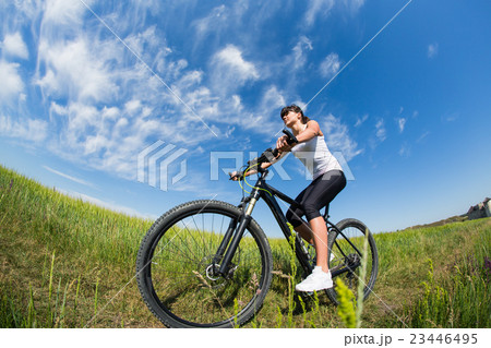 Mountain biking happy sportive girl relax in Mountain biking happy sportive girl relax in 23446495