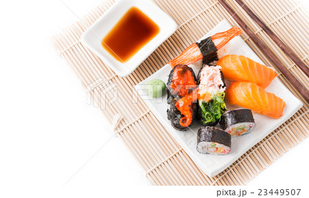 Mix Sushi on white dish isolated 23449507