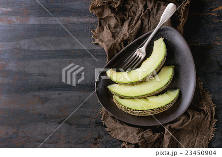 Sliced melon with cherry Sliced melon with cherry 23450904