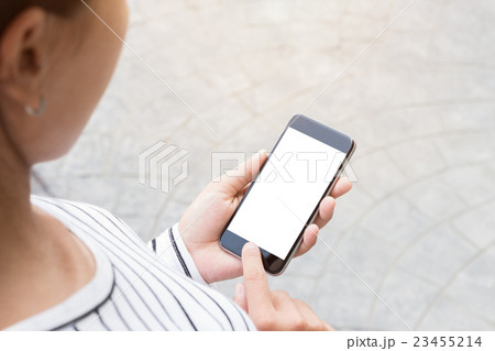 close up woman use phone on road in city close up woman use phone on road in city 23455214