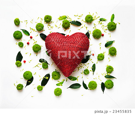 Heart with pattern from petals of  flowers. 23455835