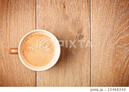 Coffee Cup On Wooden Table 23468340