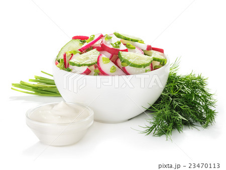 salad of radish and cucumsers in bowl 23470113