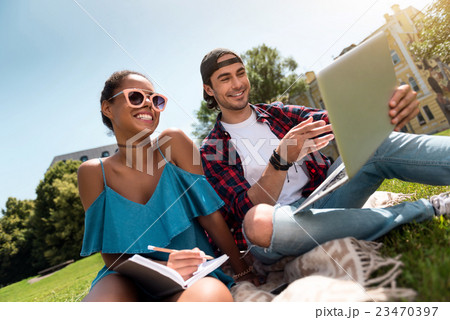 Modern youth relaxing outdoors Modern youth relaxing outdoors 23470397