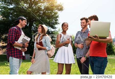 Modern youth relaxing outdoors Modern youth relaxing outdoors 23470420