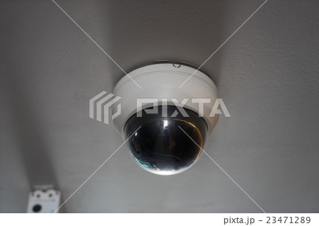 CCTV camera in office building at night 23471289