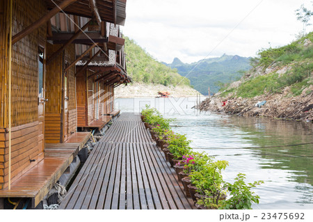 walk path with flower pot, floating house Rafting 23475692