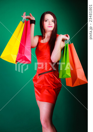 Woman with shopping bags. 23481801