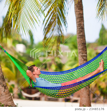 Young man relax in hammock  23485176