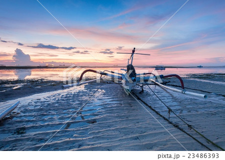 Reflection Sunrise in Tanjong Benoa with boat 23486393