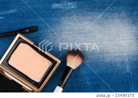 Still life from cosmetics on ragged jeans Still life from cosmetics on ragged jeans 23490375