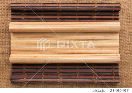 Two bamboo mat twisted in the form of a manuscript Two bamboo mat twisted in the form of a manuscript 23490497