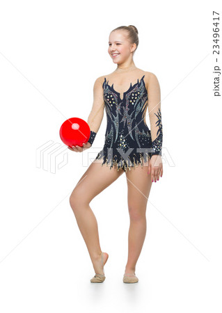 Beautiful gymnast girl with red ball Beautiful gymnast girl with red ball 23496417