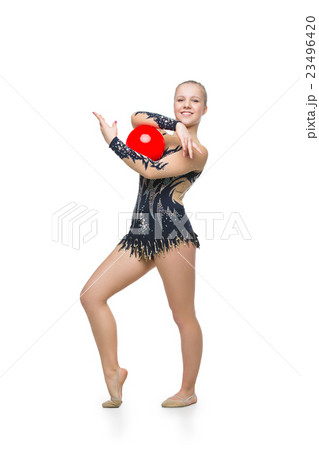 Beautiful gymnast girl with red ball Beautiful gymnast girl with red ball 23496420