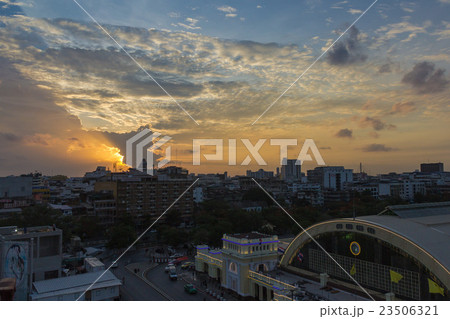 Sunset and color of sky over silhouette city. 23506321