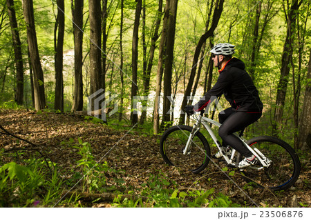 Cyclist Riding the Bike on a Trail in Summer 23506876