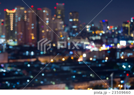 Blurred bokeh lights city building Blurred bokeh lights city building 23509660