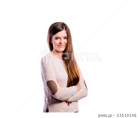 Girl in brown sweater, young woman, studio shot 23510148