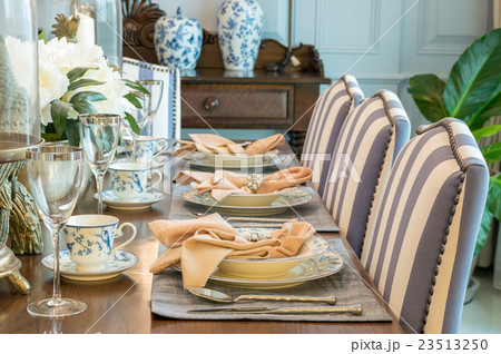 luxury table set in classic style dining room 23513250