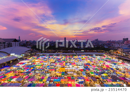 Aerial view, multiple colour rooftop night market  23514470