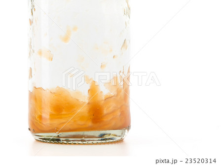 sauce bottle on white background 23520314