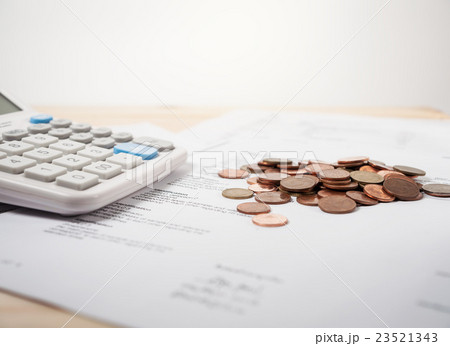 Bill of medication with calculator and coins Bill of medication with calculator and coins 23521343