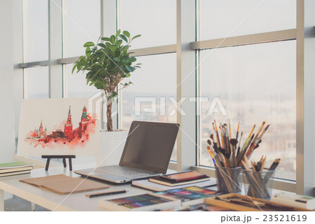 Painter workplace in order side view. Designer 23521619