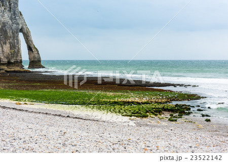 The beach and stone cliffs in Etretat, France 23522142