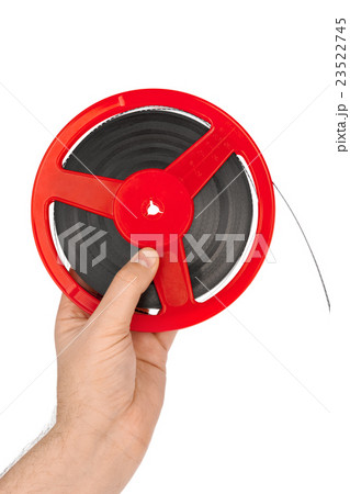 Cinema film reel in hand 23522745