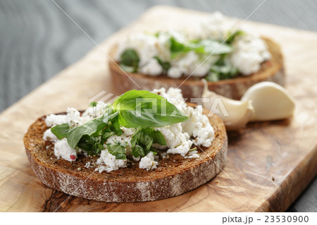 rye sandwich or bruschetta with ricotta, herbs and rye sandwich or bruschetta with ricotta, herbs and 23530900
