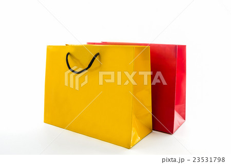 Blank red and yellow paper shopping bag. 23531798