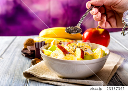 Healthy breakfast with apple, banana and chia seed 23537365
