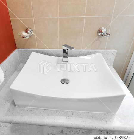 Faucet in bathroom 23539825